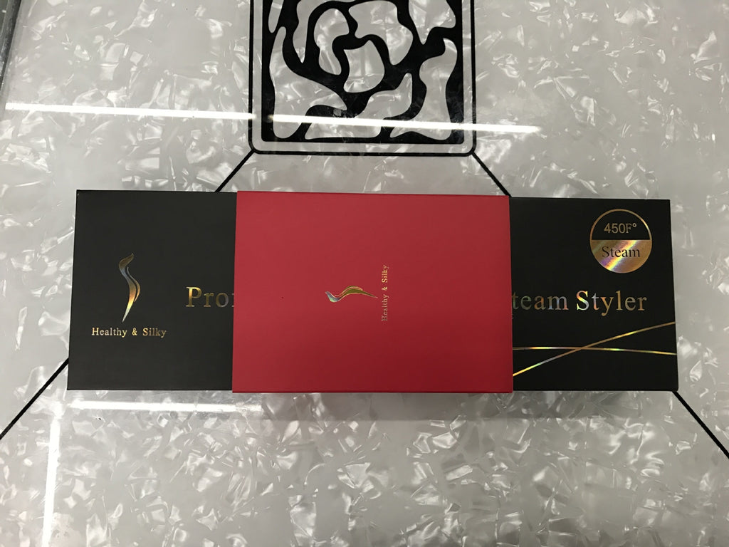 Lisseur à vapeur à pince